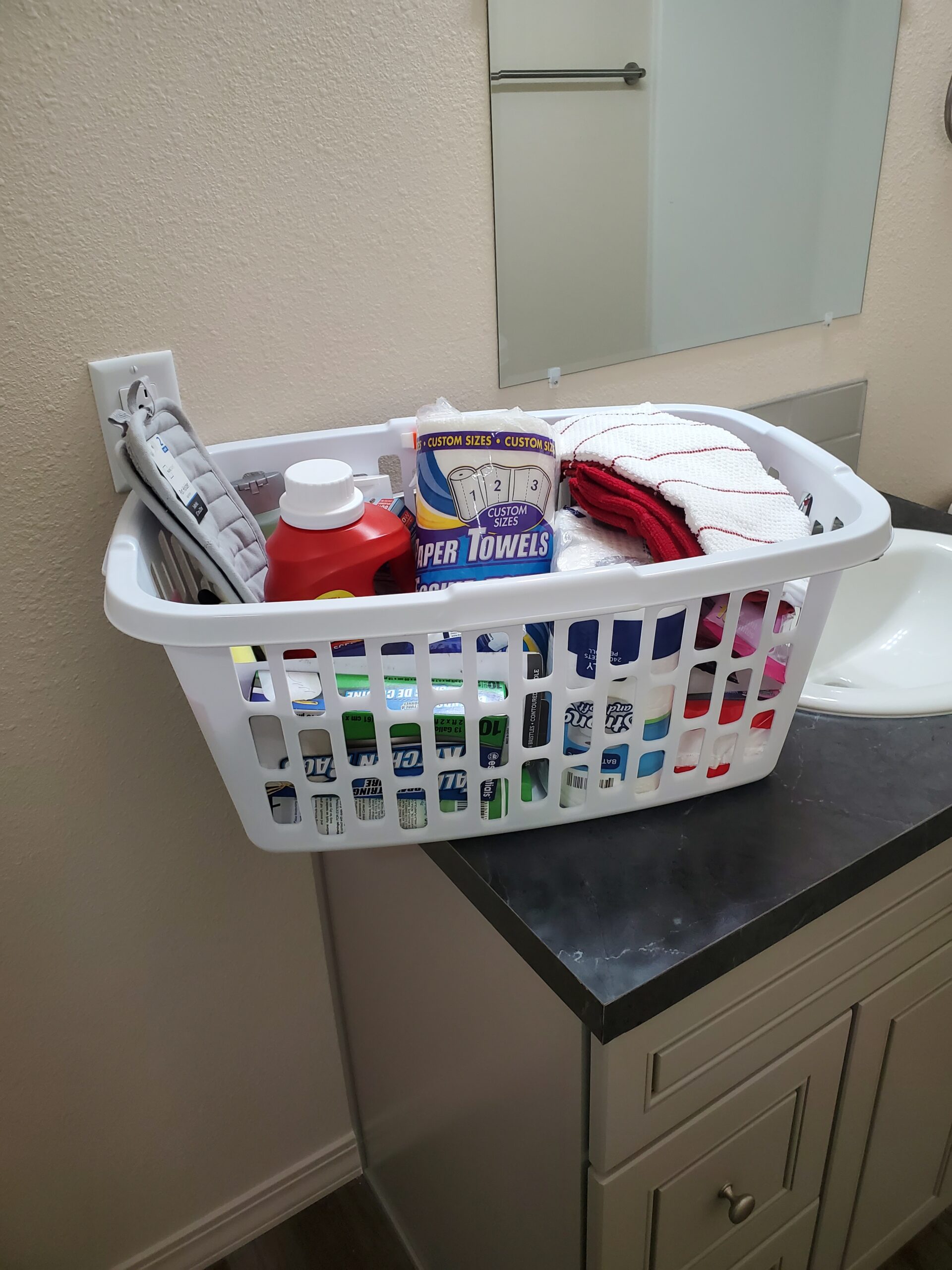 Basket of home goods donated by Martha's Cupboard.