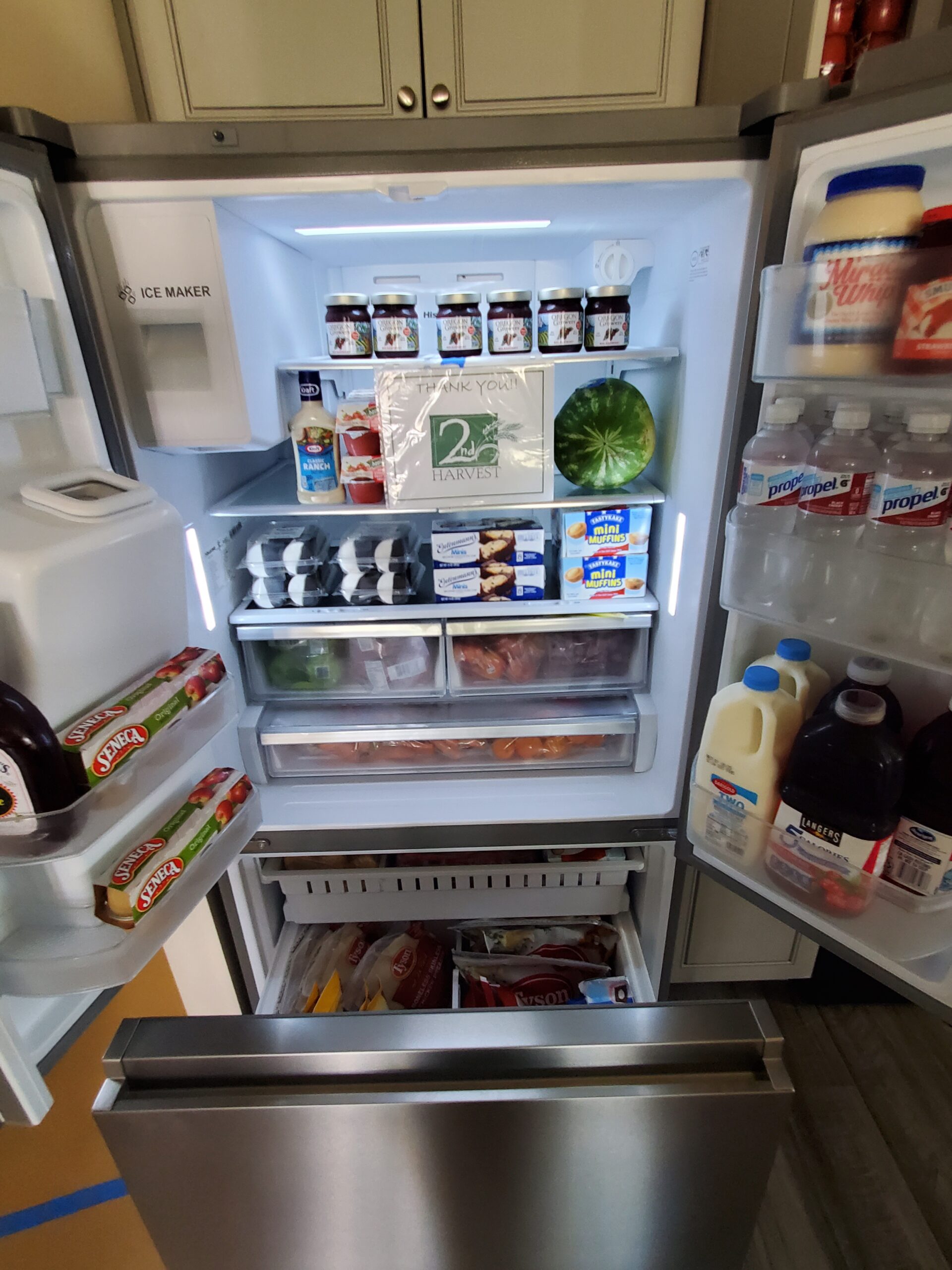 Fridge full of food donated by Second Harvest Tri-Cities.